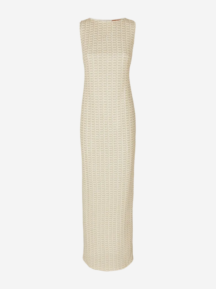 A sleeveless beige maxi dress made of tonal lace fabric, photographed against a white background.