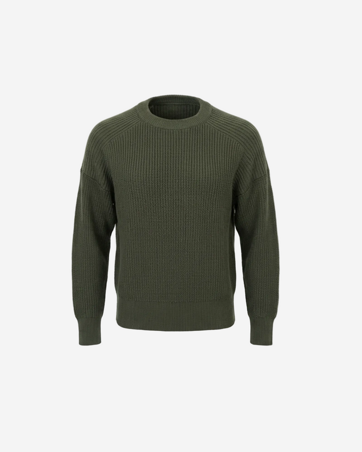 Green ribbed sweater on a white background