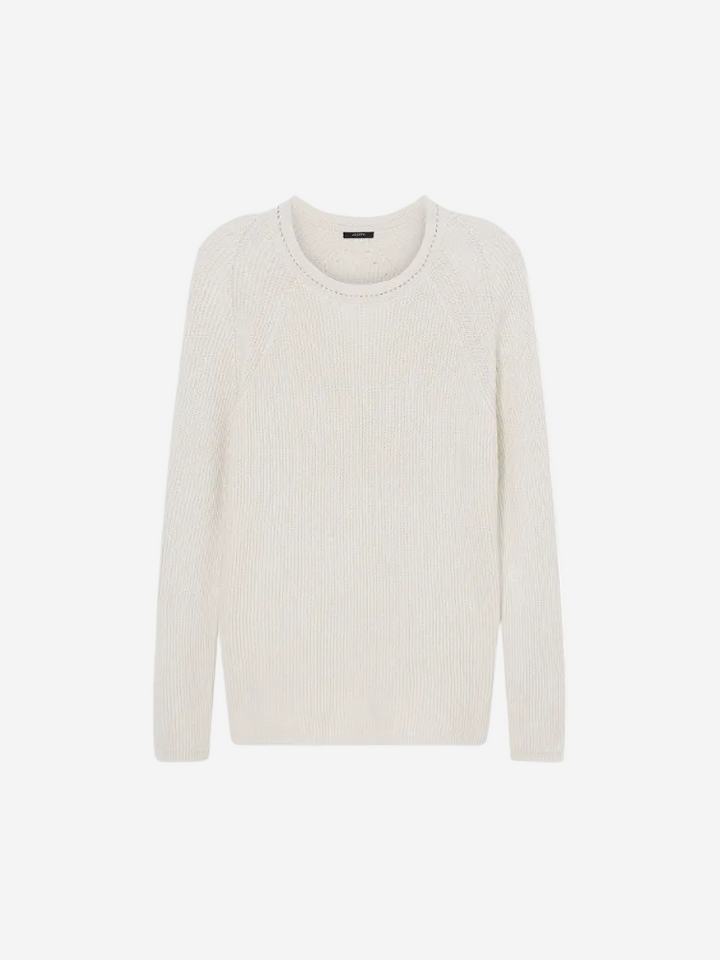 A round neck, long-sleeved, beige linen blend sweater.