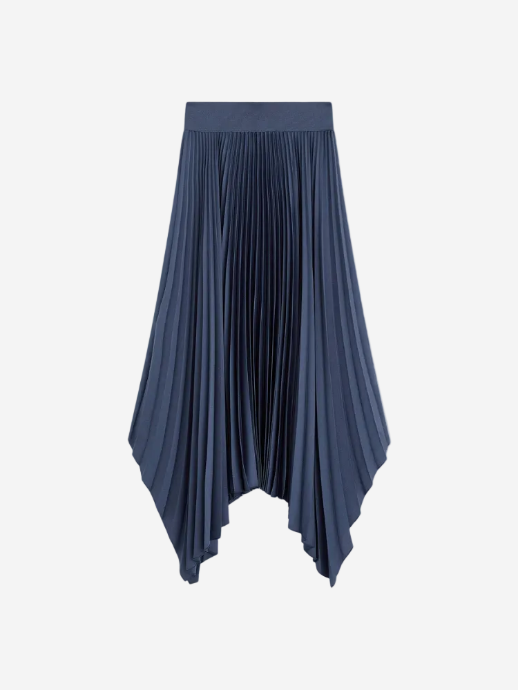 A navy blue, pleated, A-line midi skirt with an asymmetric hem, made from a knit weave.