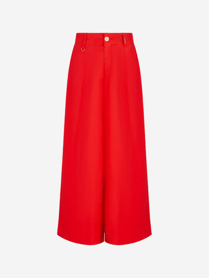 A pair of red culotte-style trousers with a high waist and wide legs.