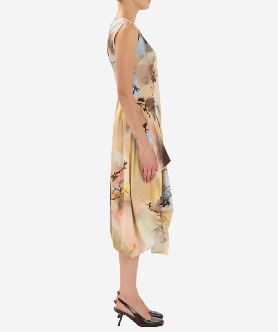 Woman wearing a floral dress on a white background