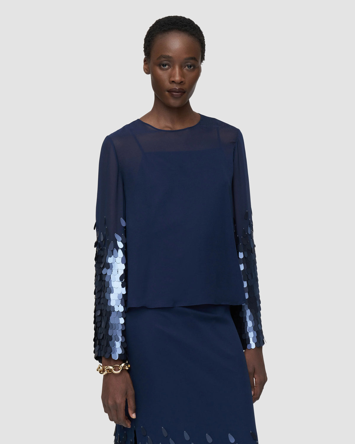 Front view of the JOSEPH Ariane sheer chiffon blouse with sequin-trimmed sleeves in Prussian blue