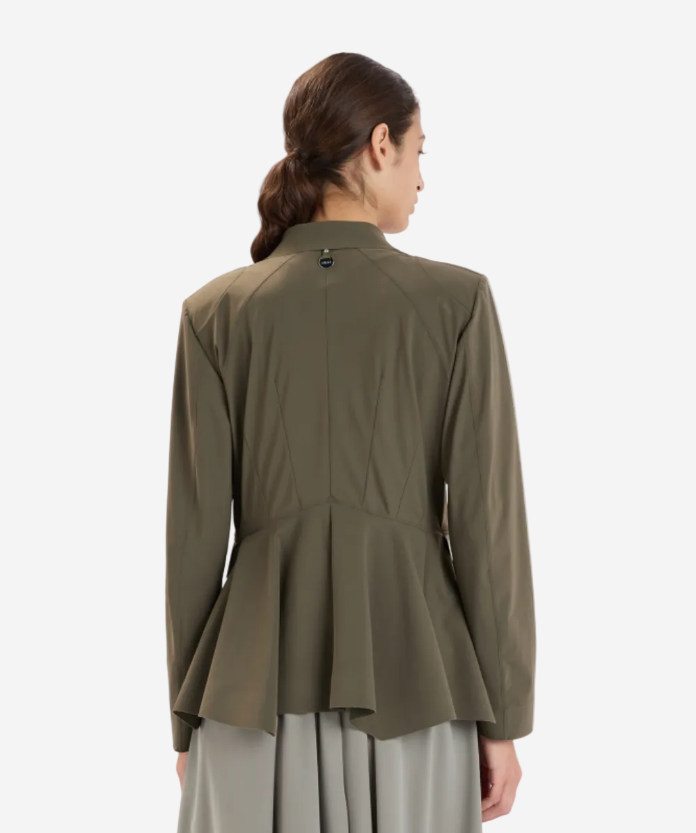 Person wearing a green jacket on a white background