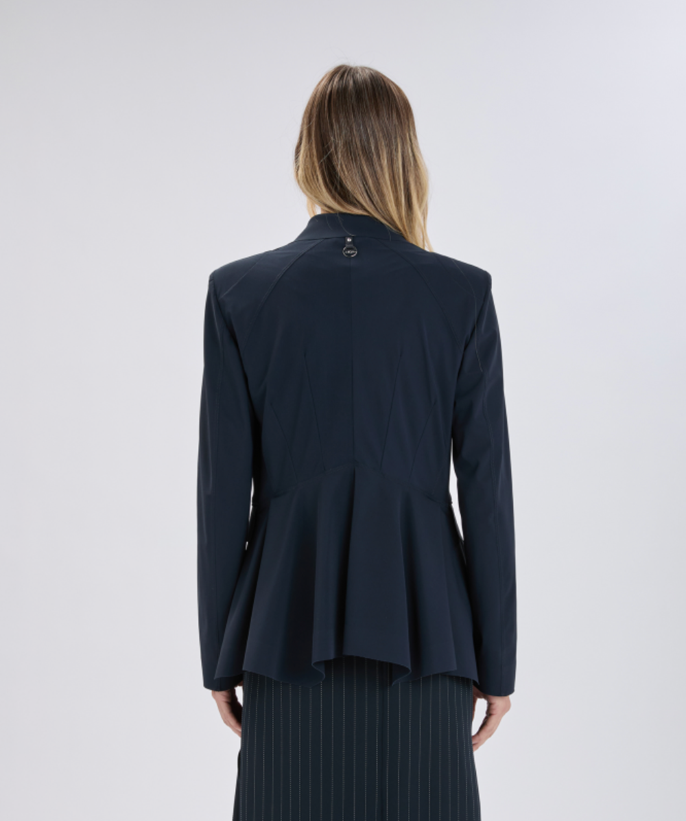 Person wearing a navy blazer on a white background