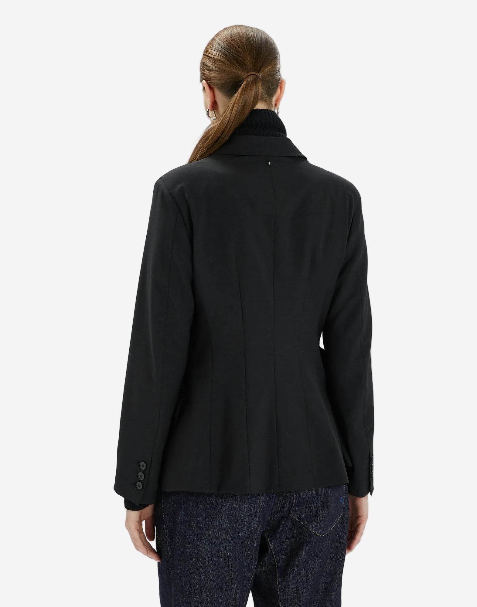 Person wearing a black jacket on a white background
