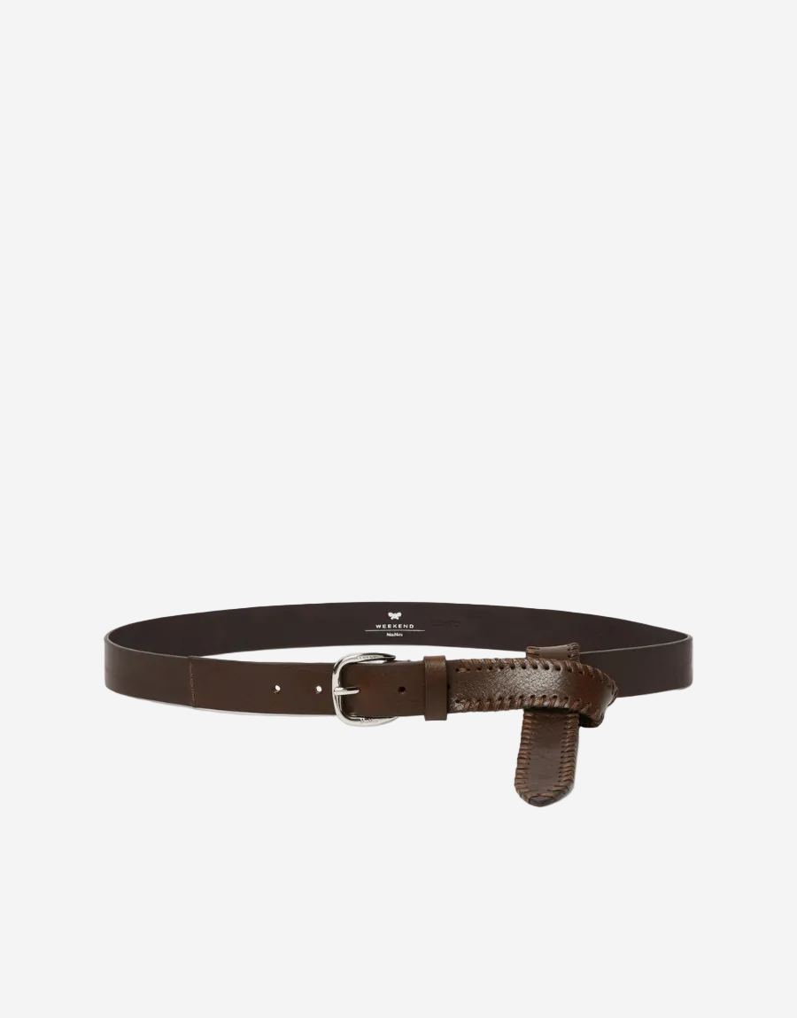 Brown leather belt on a light gray background
