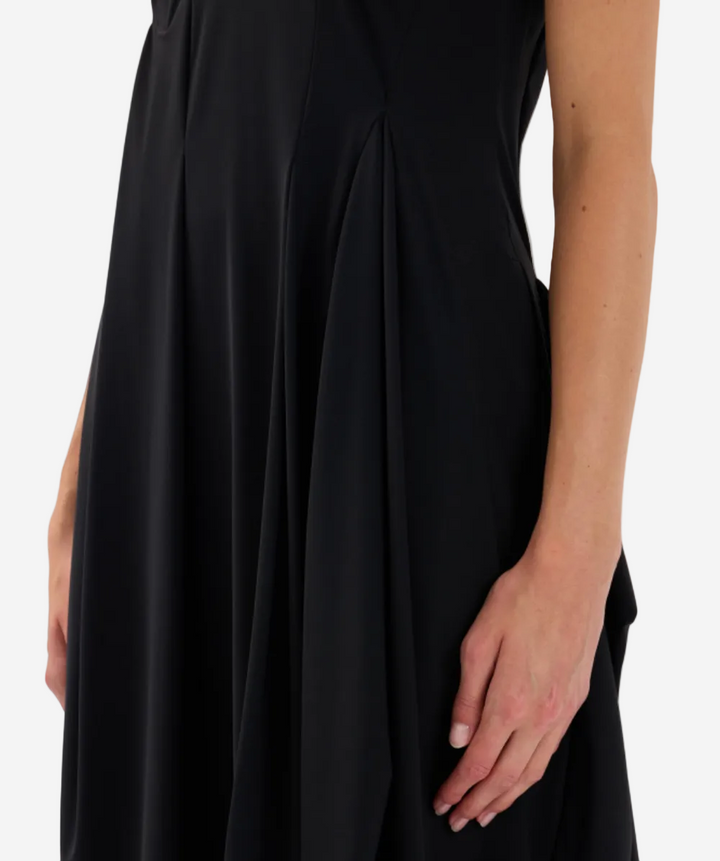 Black dress with a plain background