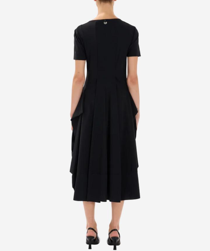 Black dress with a draped design on a white background