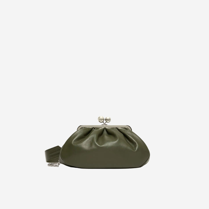 Green clutch bag on a white background