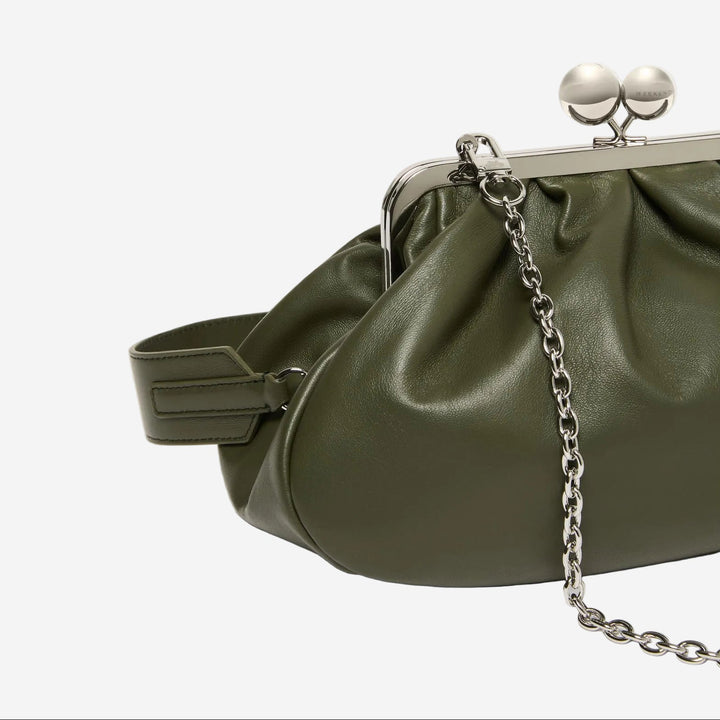 Green handbag with a chain detail on a white background