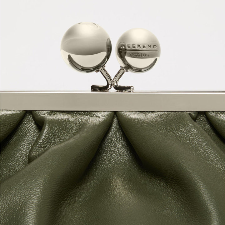 Silver clutch with 'Weekend' text on a white background