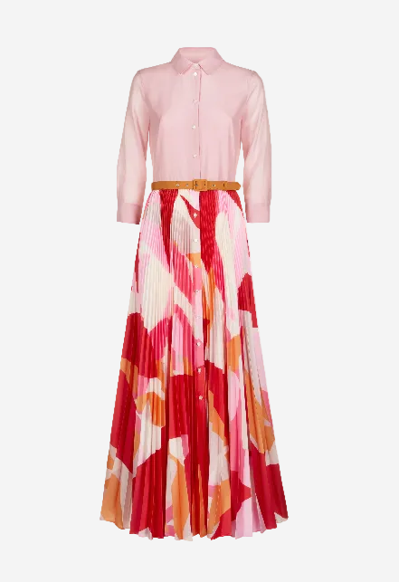 Pink shirt with a colorful, patterned skirt on a white background