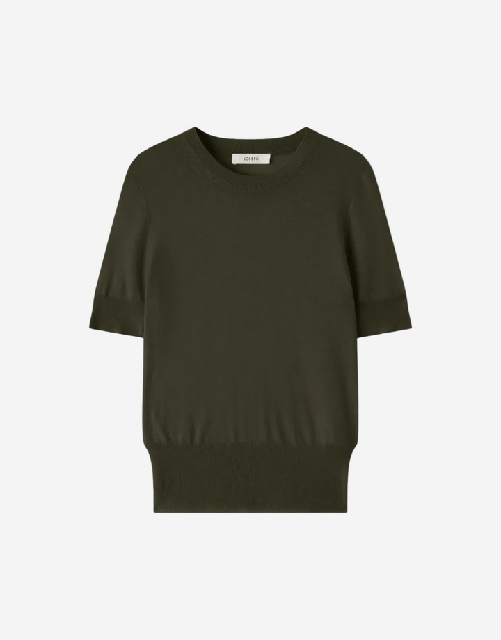 Green sweater on a white background