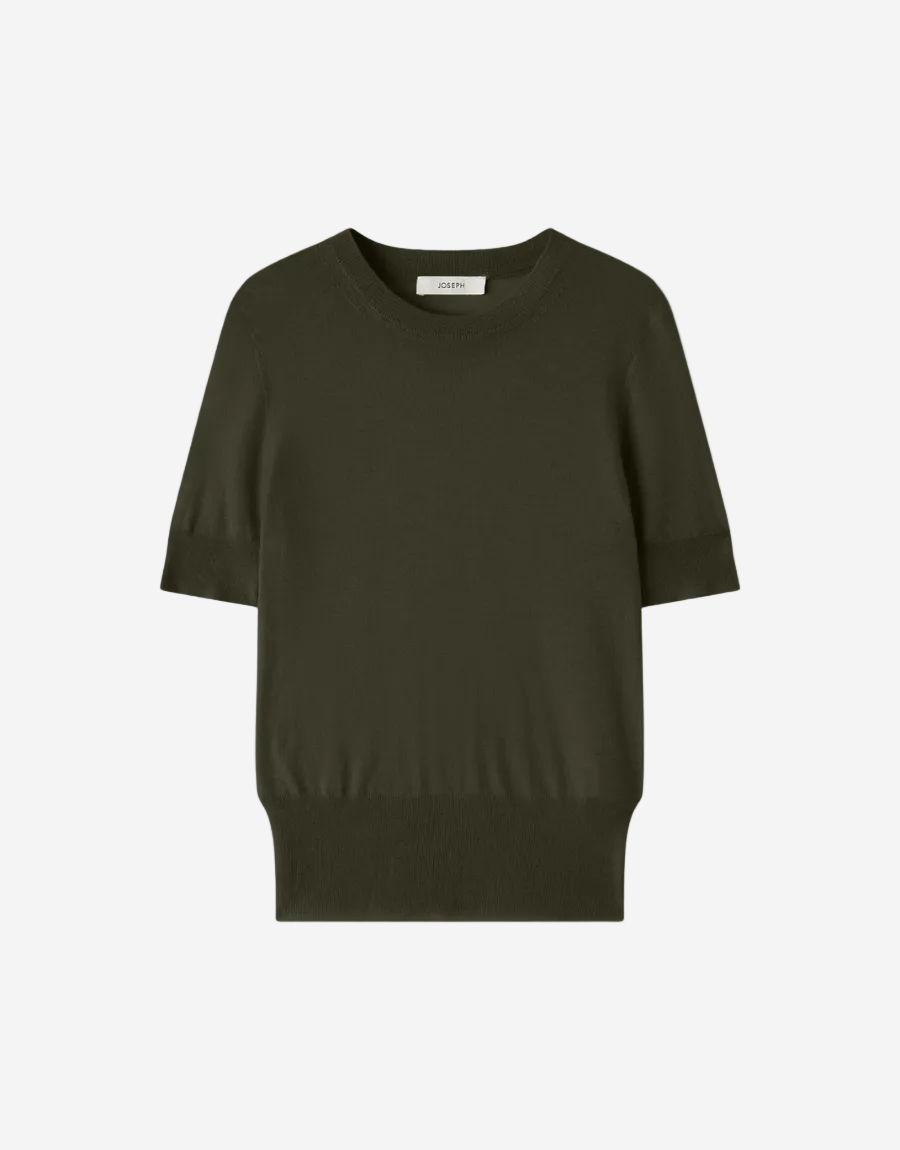 Green sweater on a white background