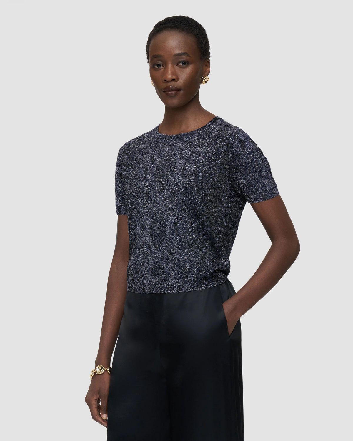 JOSEPH Char cropped metallic knit top in Prussian blue snake jacquard, worn at Christensen Copenhagen Sydney