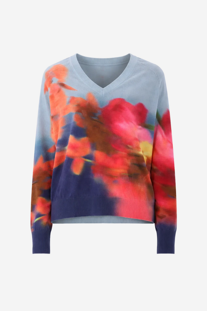 Floral patterned sweater on a white background
