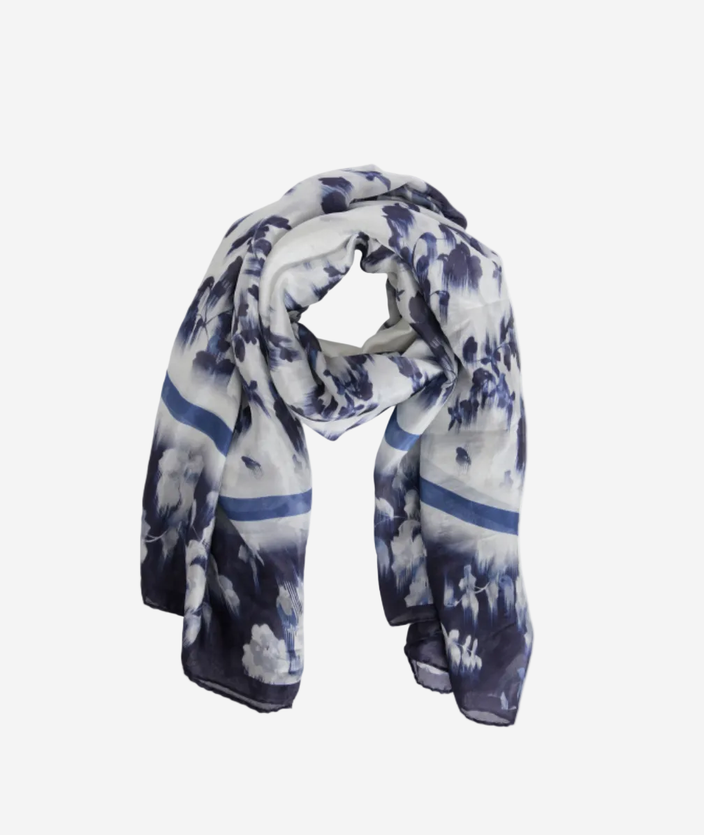 Navy and white floral patterned scarf on a white background