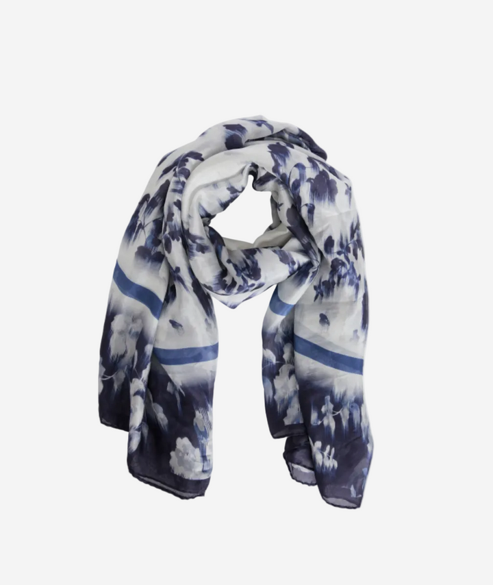 Navy and white floral patterned scarf on a white background