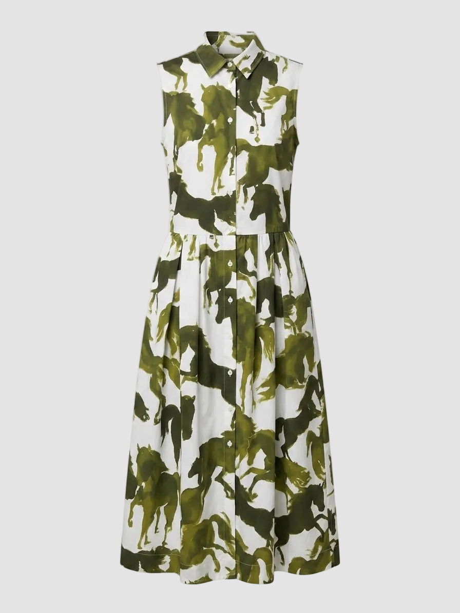 Green and white camouflage dress on a light gray background