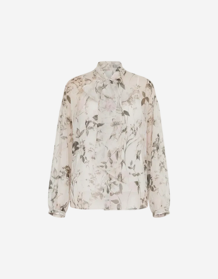 Floral patterned blouse on a white background
