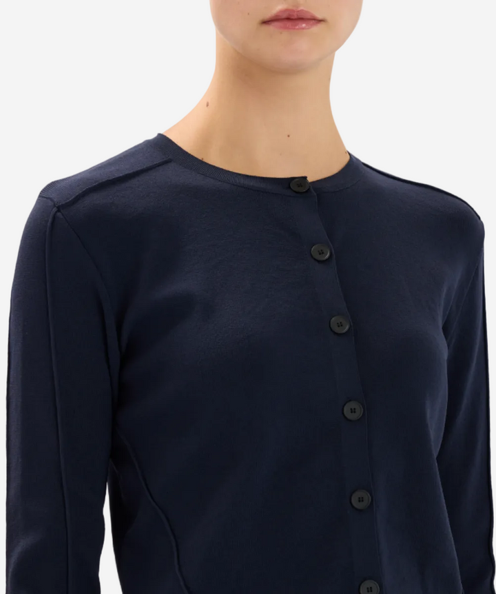 Navy blue cardigan with button details on a white background