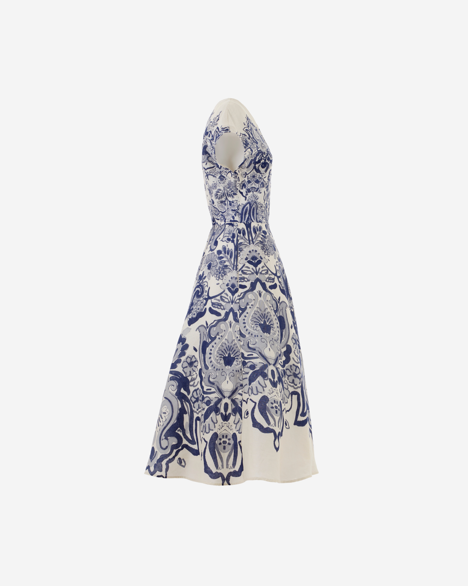 White dress with blue floral pattern on a white background