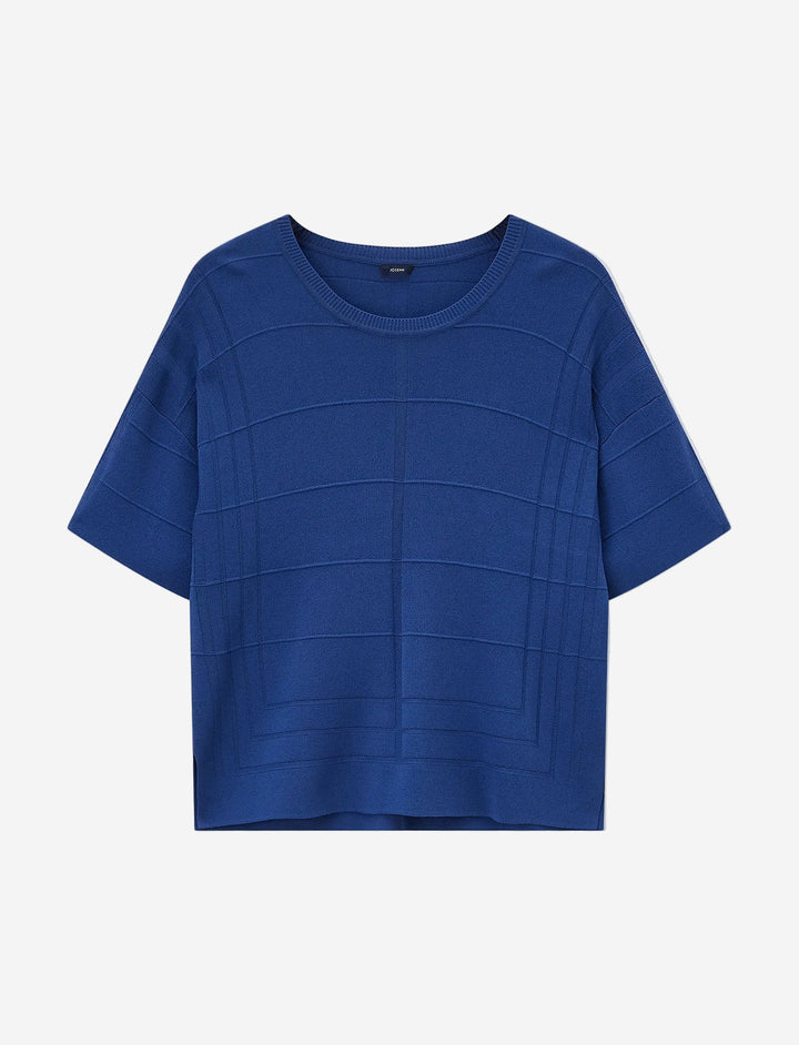 Blue short-sleeve top on a light gray background