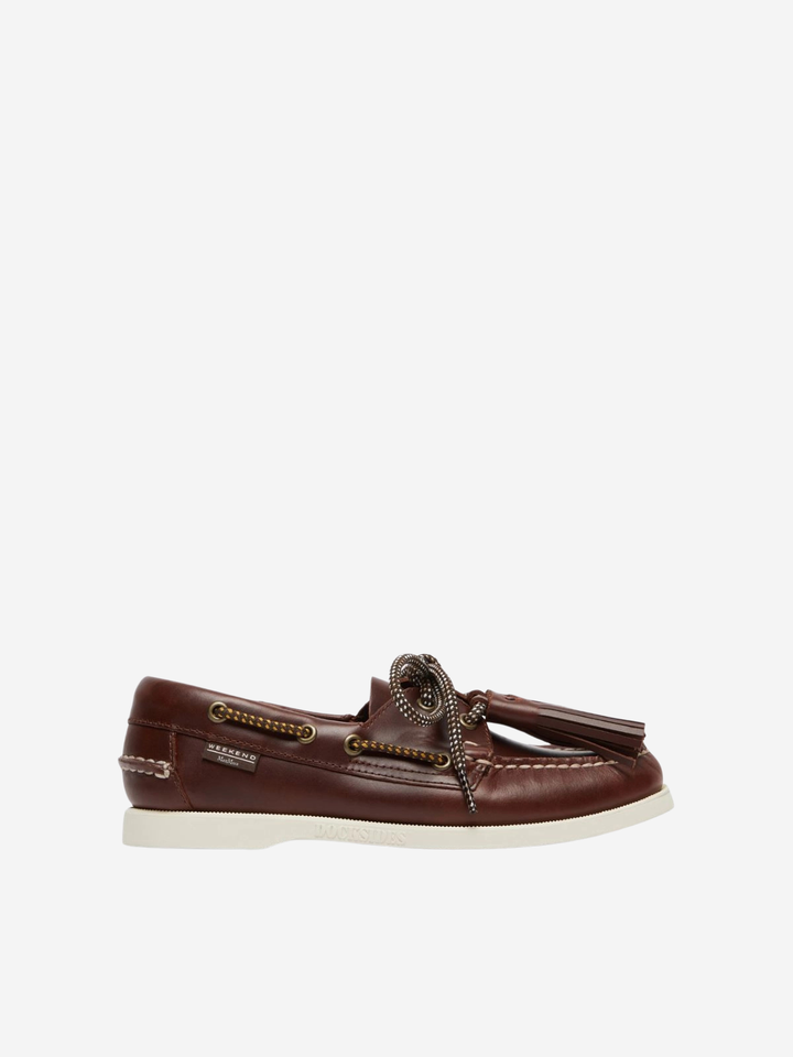 Brown suede loafer shoe on a white background