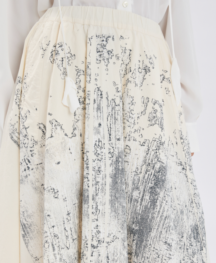 White dress with black abstract pattern on a white background