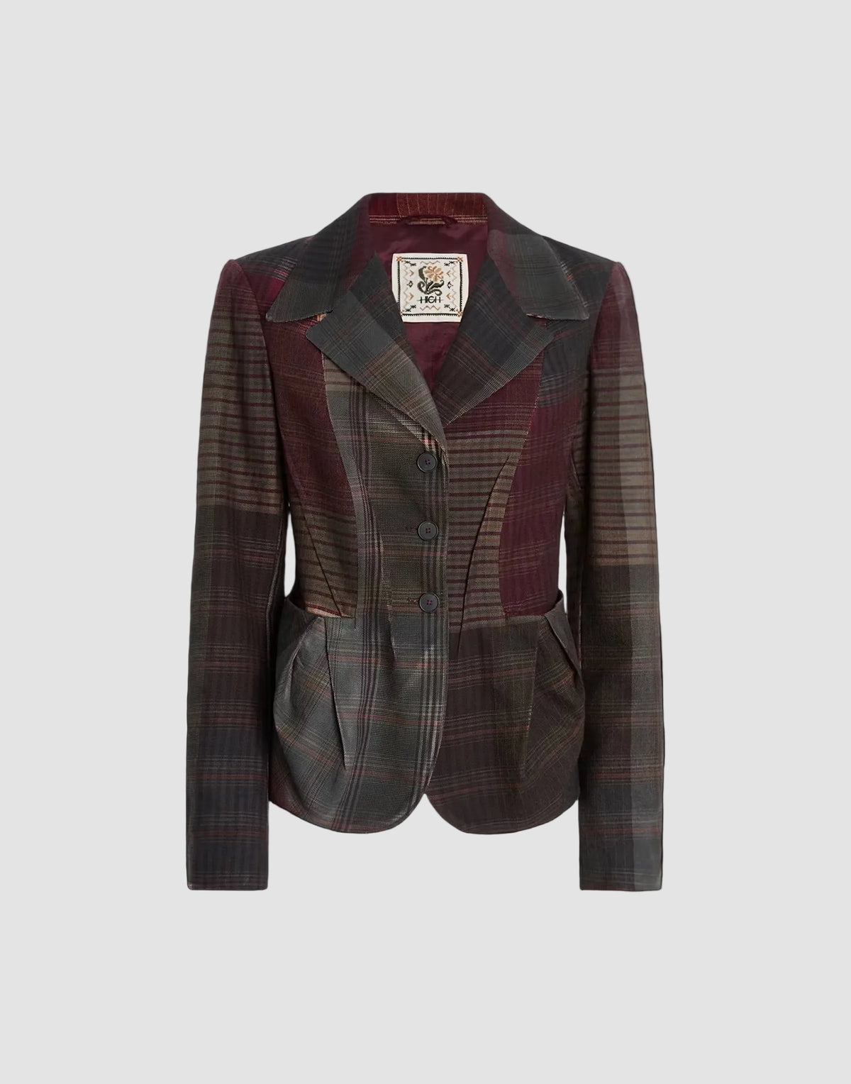 A vintage-style tailored blazer with a dark gray and burgundy plaid pattern, featuring a structured collar, three front buttons, and a peplum waist detail, shown against a solid black background.