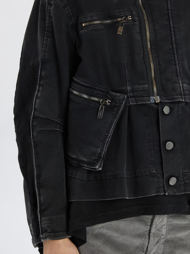 Black denim jacket with zippers and buttons on a white background