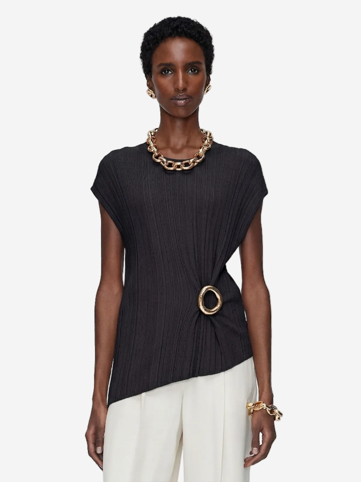 Model wearing a black top with a gold necklace and bracelet on a white background available in Australia at Christensen Copenhagen