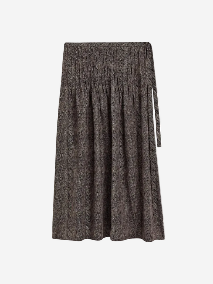 A mid-length brown skirt with a side tie and invisible side zip, crafted from crepe de chine fabric.