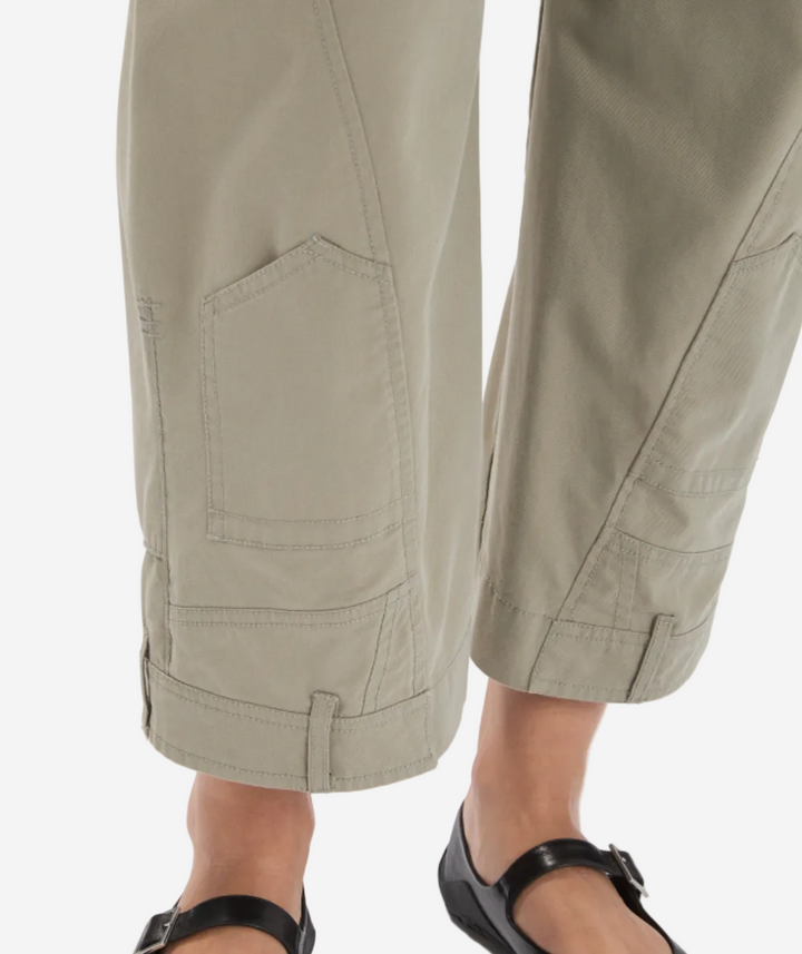 Beige pants with a pocket detail on a white background