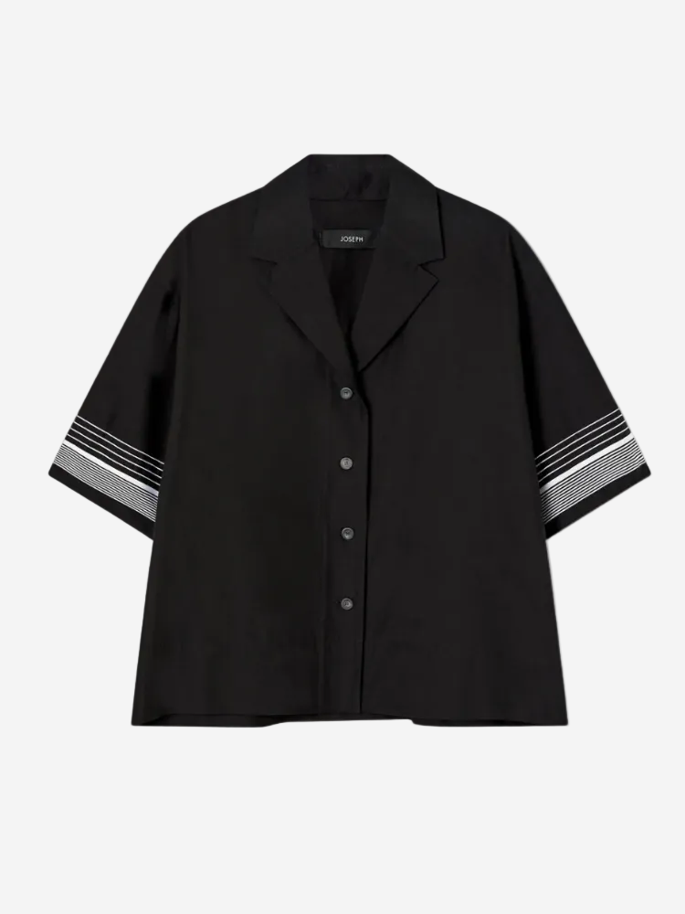 Black shirt with striped sleeves on a white background