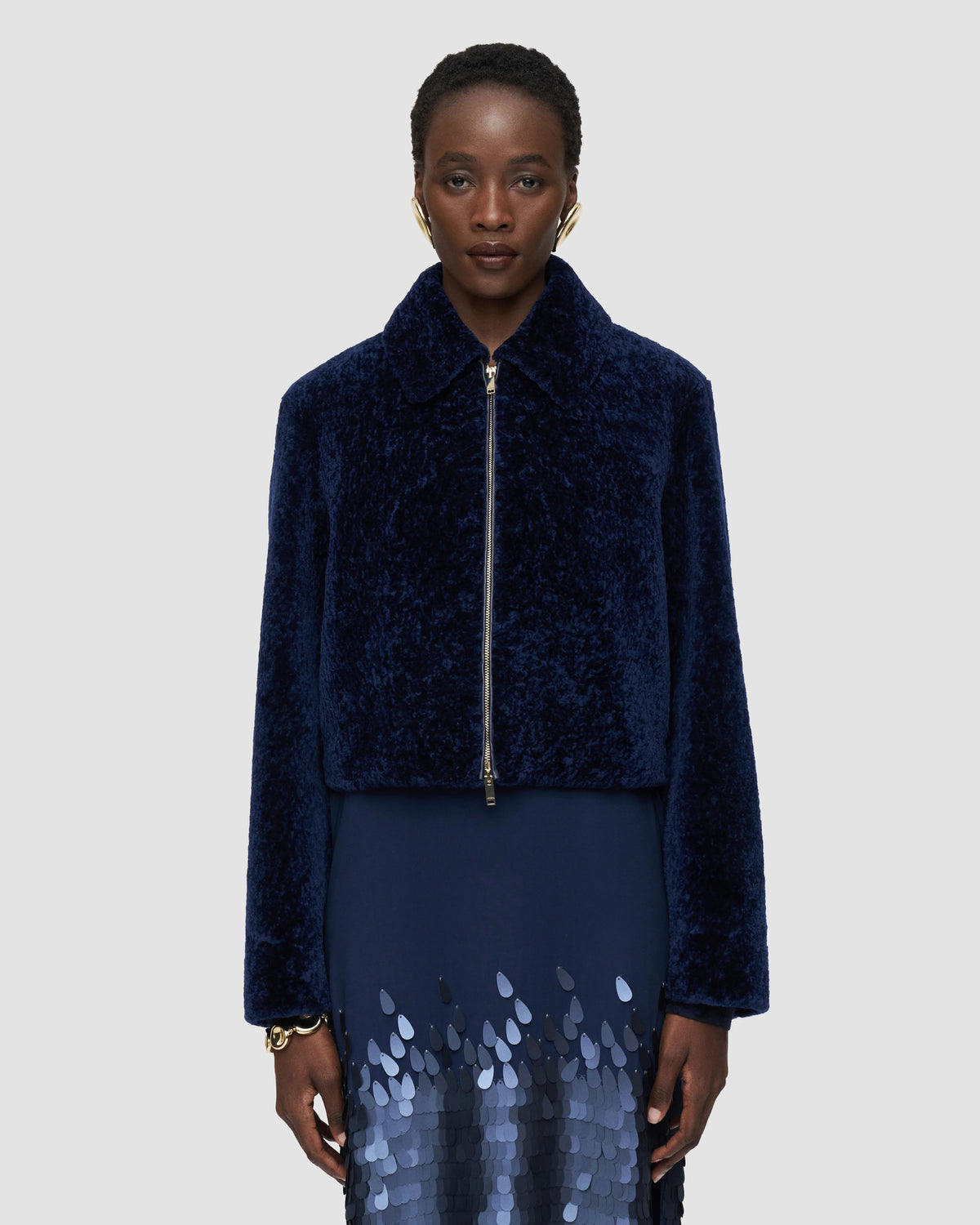 JOSEPH Liris cropped shearling jacket in Prussian blue with gold front zip, worn at Christensen Copenhagen Sydney