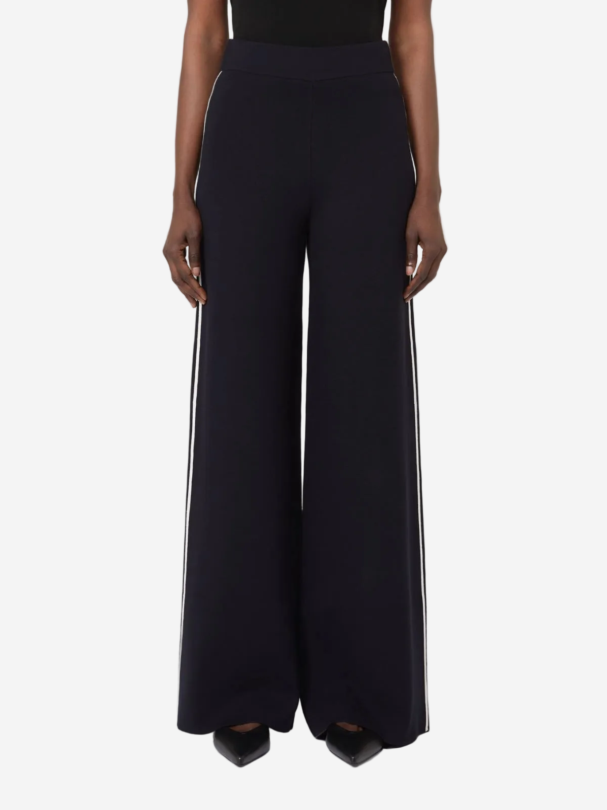 Black wide-leg pants with white stripes on a white background