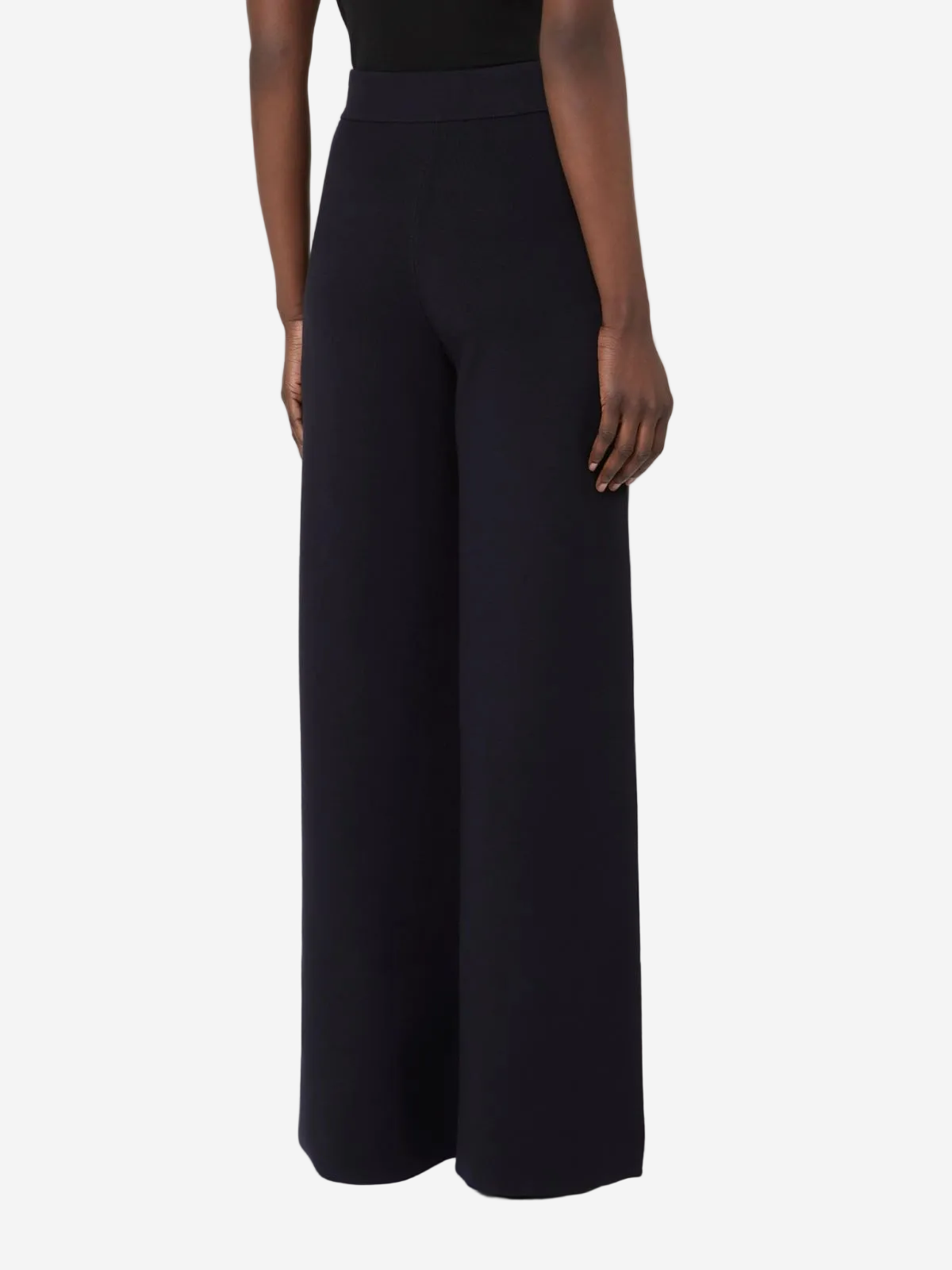 Black wide-leg pants worn by a model on a white background