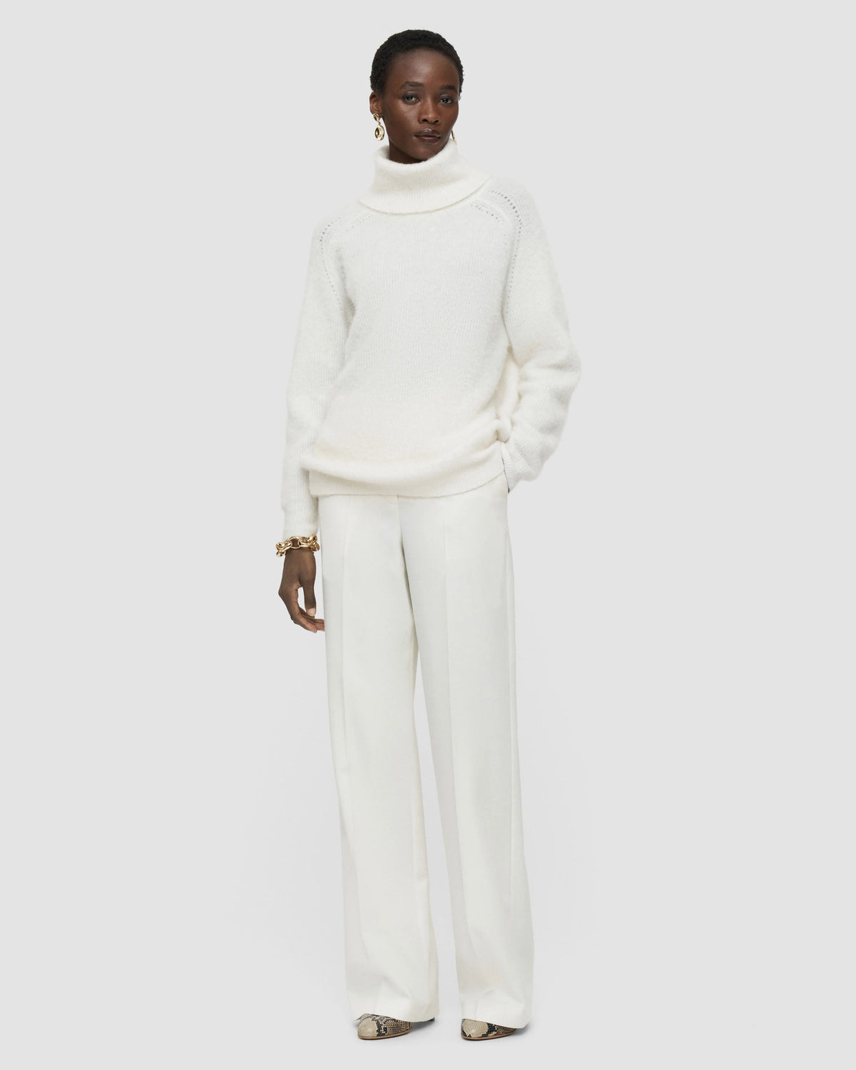 JOSEPH Mitae wide-leg trousers in Wax ivory, styled with a cream roll-neck knit at Christensen Copenhagen Sydney