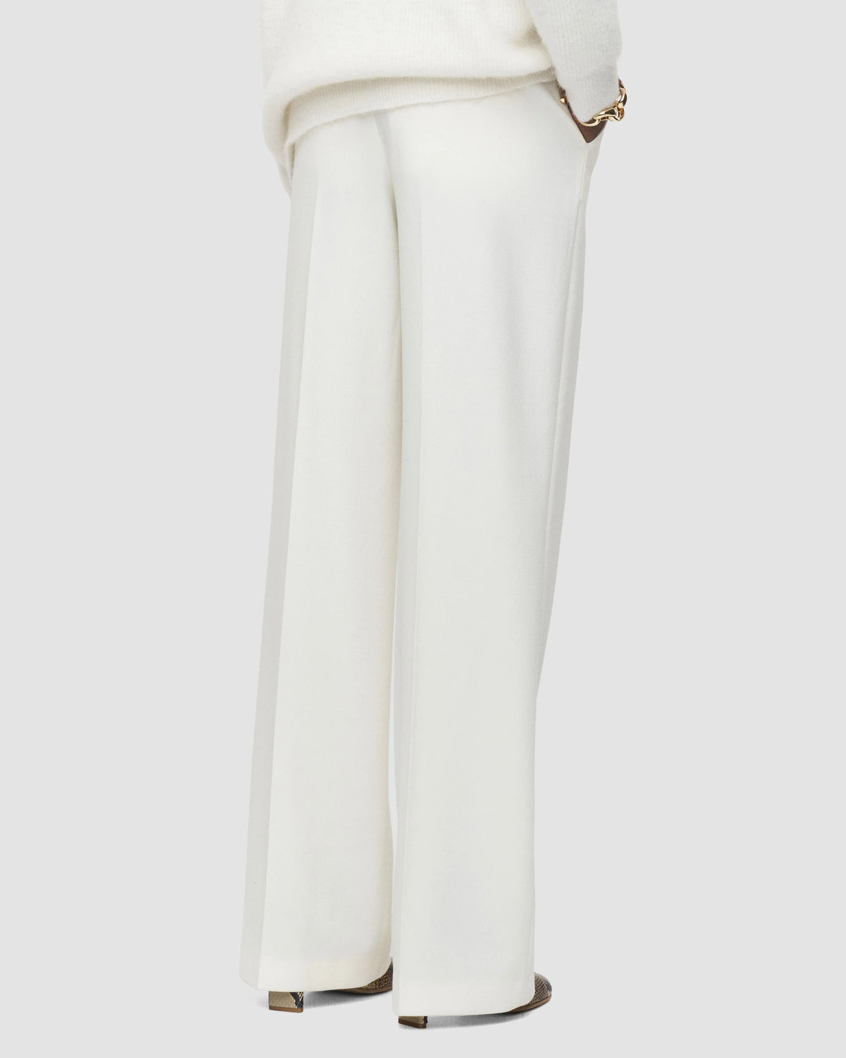 Back view of the JOSEPH Mitae ivory trousers showing the full-length wide leg