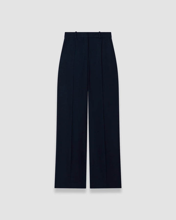 JOSEPH Mitae mid-rise wide-leg trousers in navy textured blend with pressed front seams, product shot