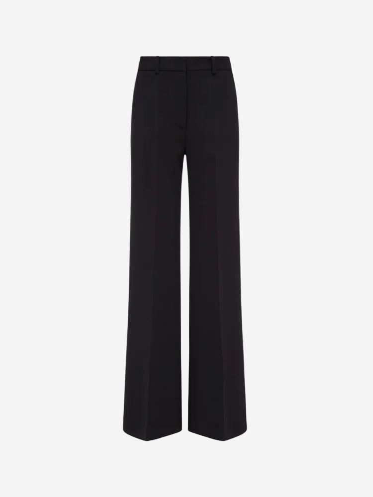 Mid-rise, black, wool stretch trousers with a gradual flare and central pressed creases.