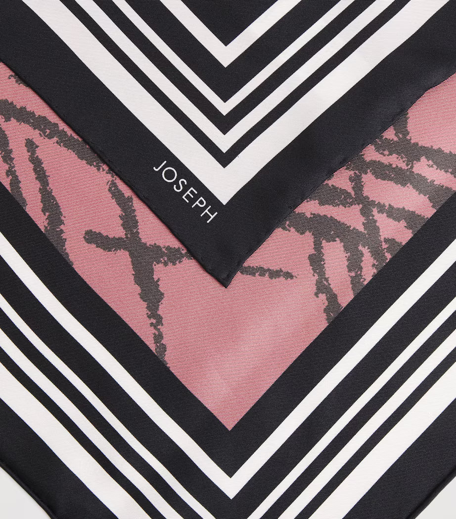 Close-up of a Joseph brand scarf with geometric pattern