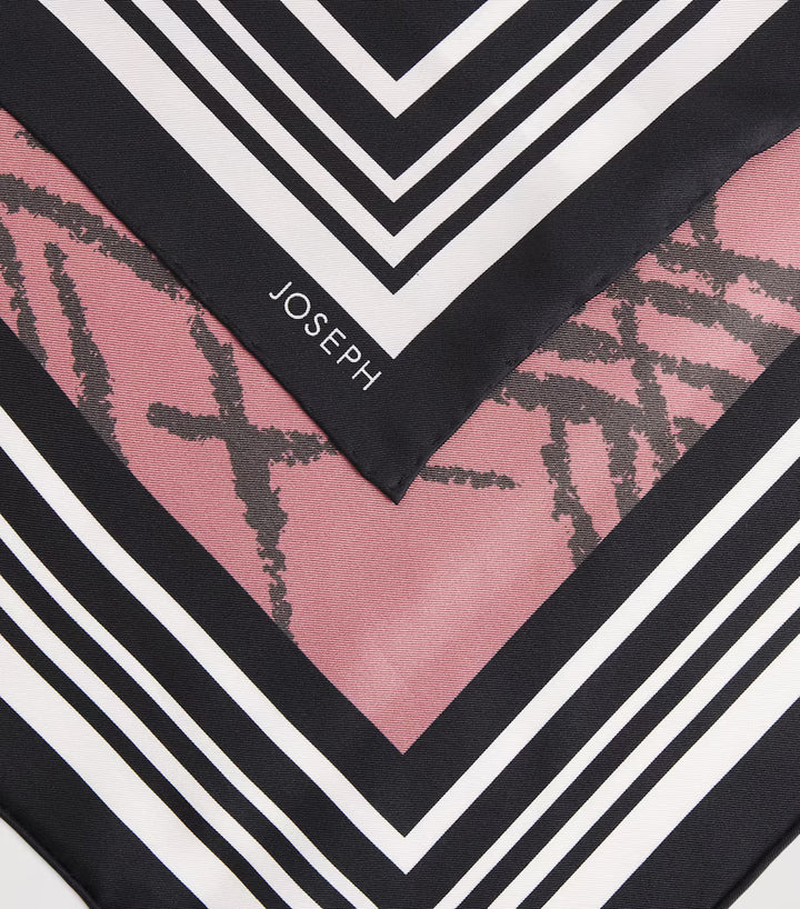 Close-up of a Joseph brand scarf with geometric pattern