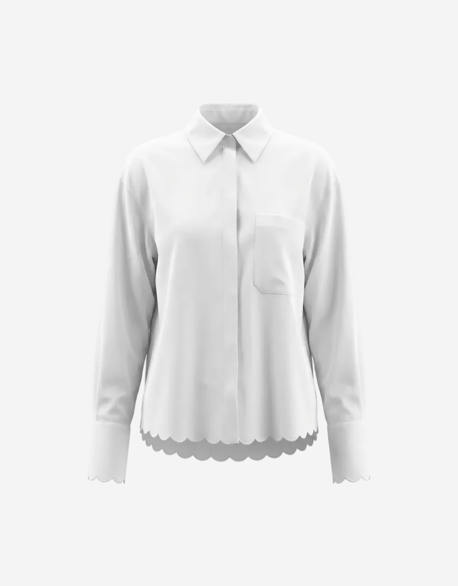White blouse with scalloped hem on a white background