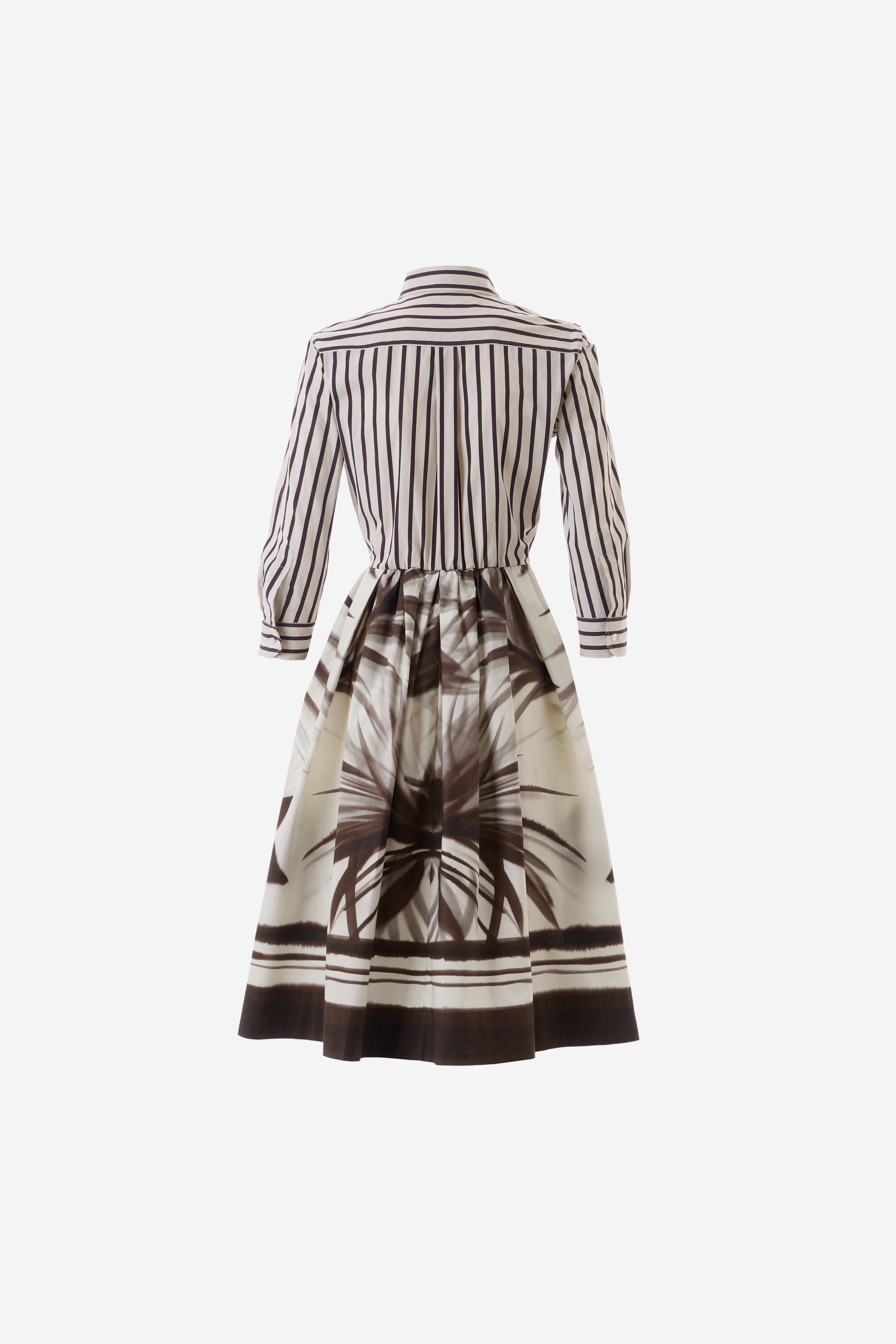 Black and white striped dress with a floral pattern on a white background