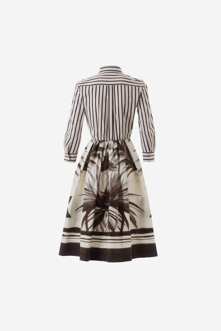 Black and white striped dress with a floral pattern on a white background