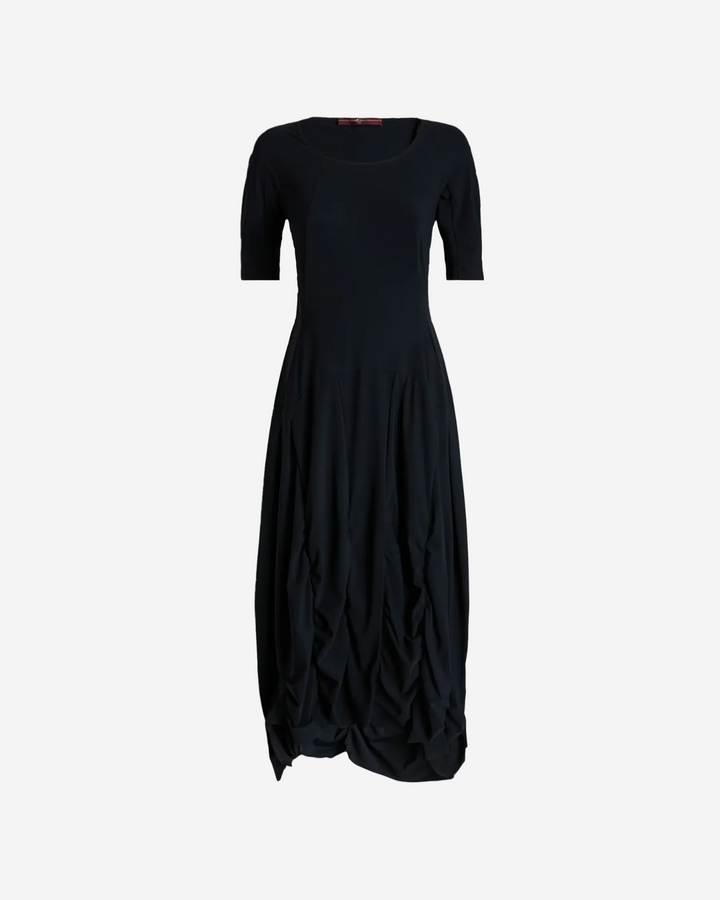 Black dress with a draped design on a white background