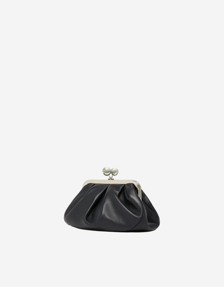 Black clutch bag with a metallic clasp on a white background